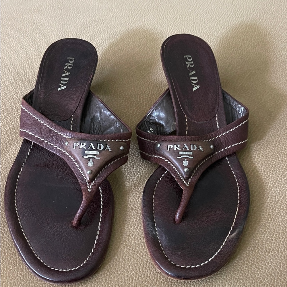 Prada woman’s Dark Brown Leather Flip-Flops